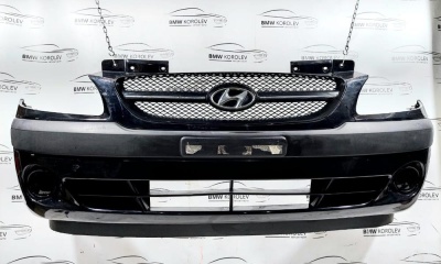 Бампер передний Hyundai Getz (черный) 865111C300